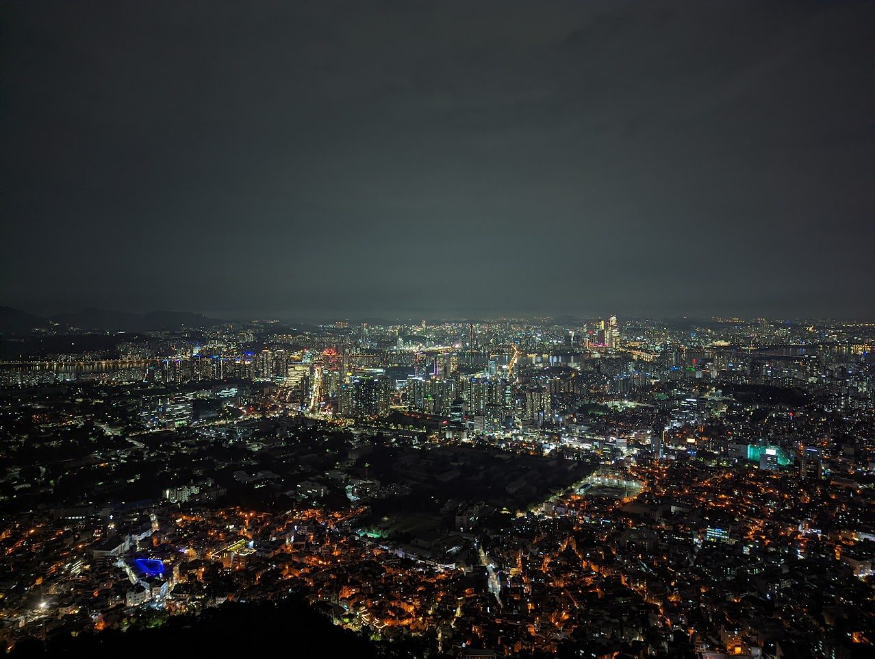 Night skyline of Seoul with city lights along the river